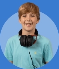 GCSE student with blonde hair on a light blue background.