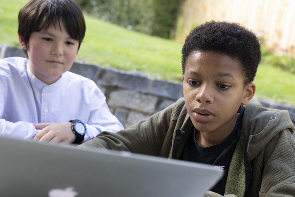 Two students learning remotely